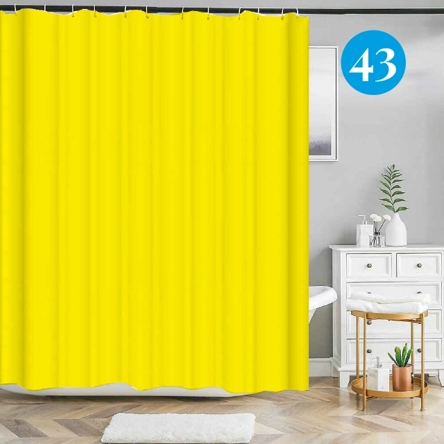 Badeforhæng – ensfarvet gul med hvide ringe og stang, glat tekstur uden mønster i badeværelse.