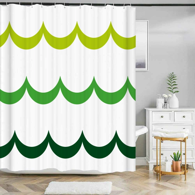 Badeforhæng – grafisk mønster med halvcirkler i lysegrøn, klargrøn og mørkegrøn på hvid baggrund.